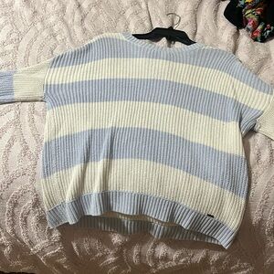 white and blue holster knit sweater, fits over sized